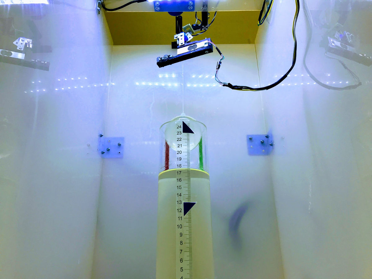 Remote Archimedes laboratory apparatus with a measuring scale